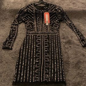 The PERFECT dress! NEVER WORN! Brand New w/ tags!